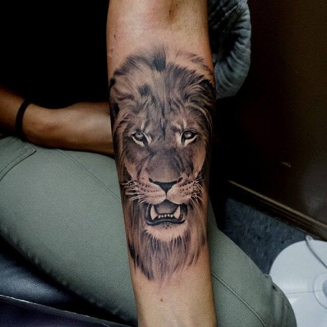 lion roar tattoo on forearm